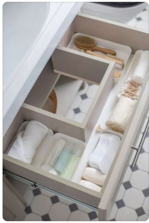 The Konmari method checklist: Kondo’s method applies to tidying up a bathroom, making it organized with the towels together.